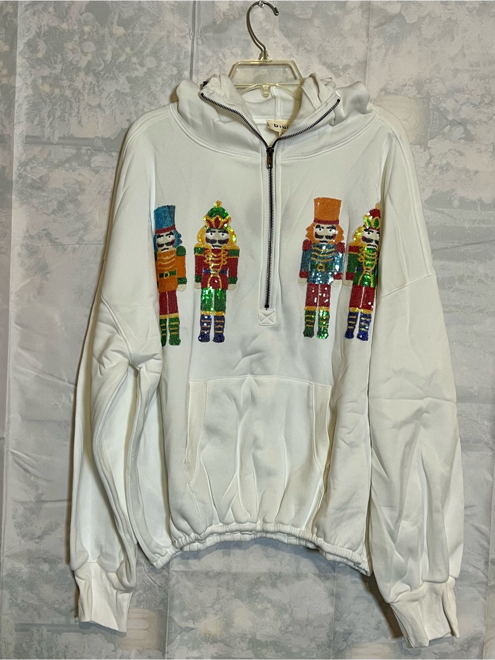 BiBi White Half-Zip Hoodie with Sequin Nutcracker Row